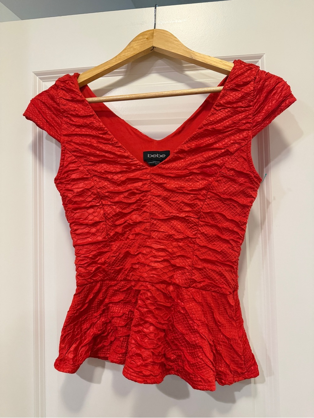 bebe Red Ruched Peplum V-Neck Blouse